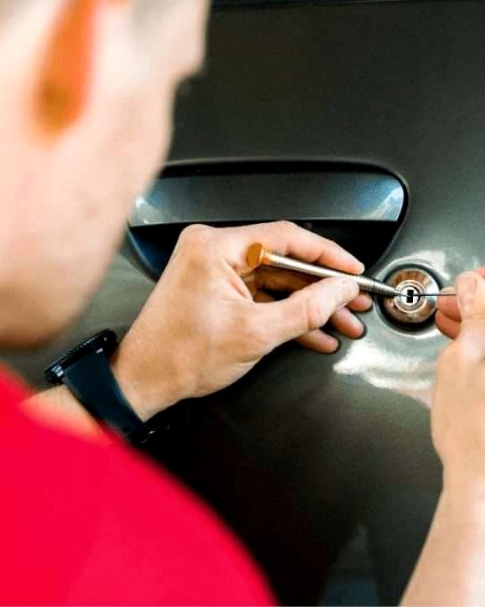 Car door and lock cylinder during automotive key work