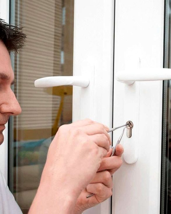 Glass storefront door with a commercial lock cylinder