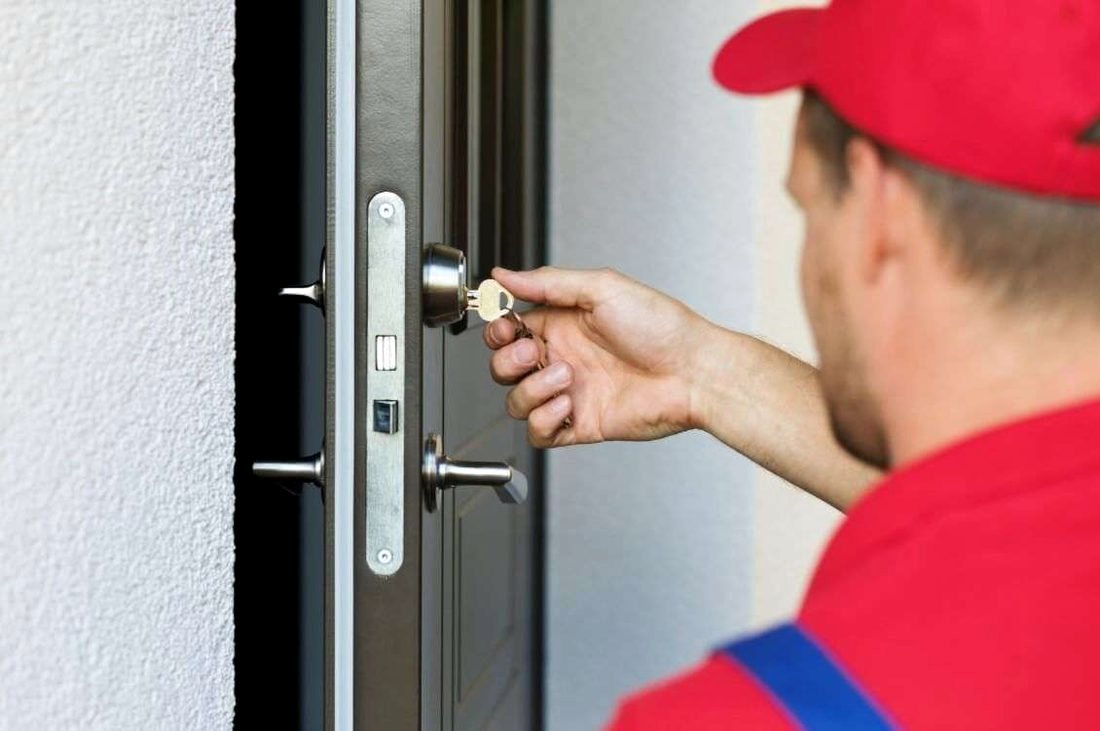 Apartment door with the lock being worked on
