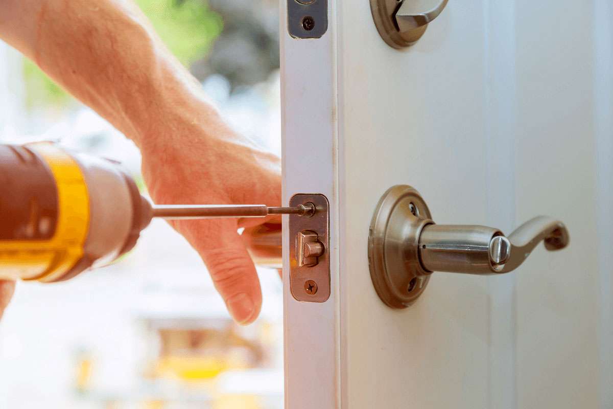 Residential locksmith installing a smart lock